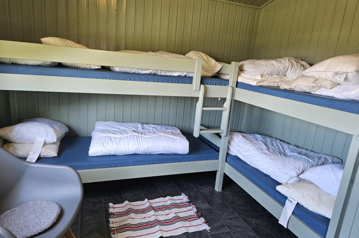 Two bunk beds in the pilgrim cabin.
